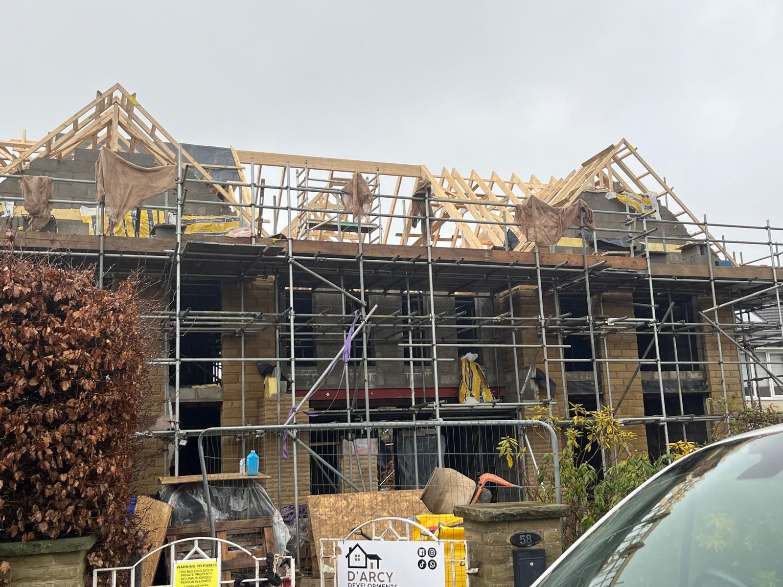 Wide view of a large home extension with timber roof structure